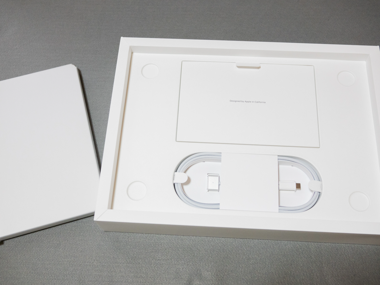 Designed by Apple in California